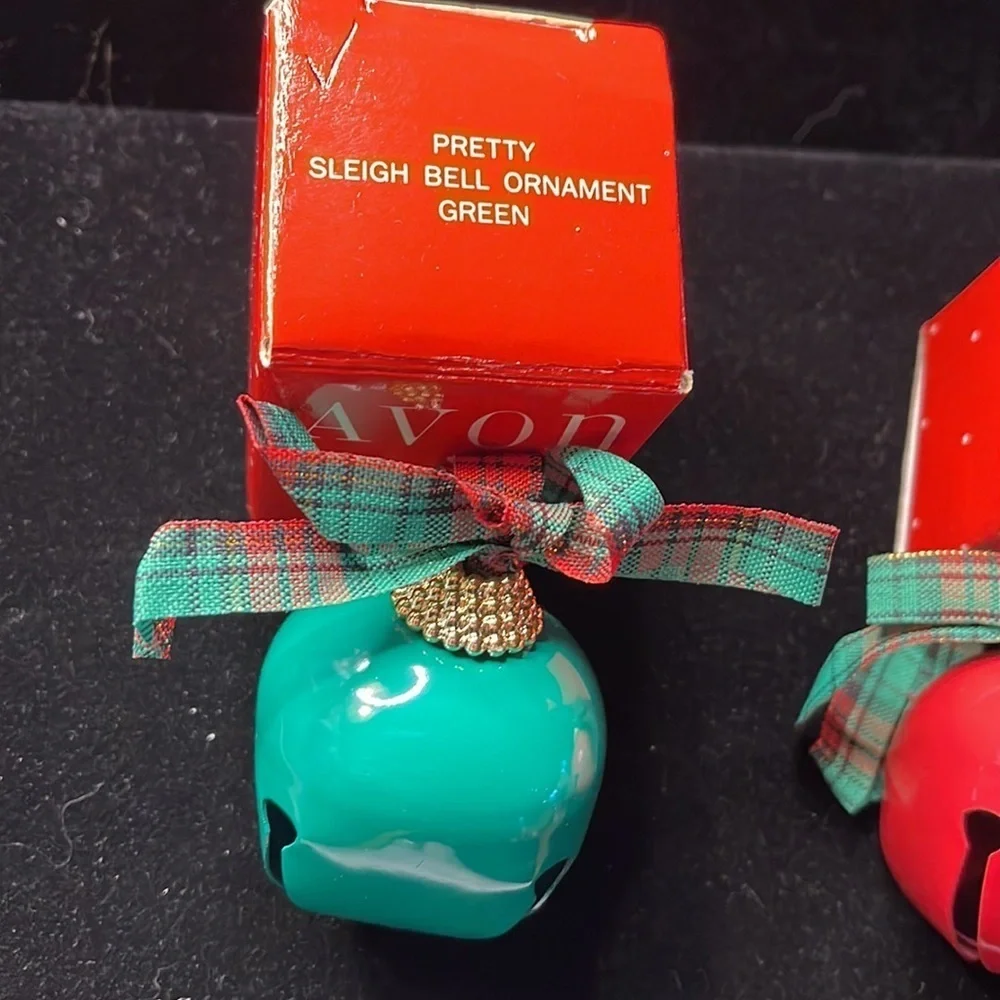 Set of 2 (1 red/1 green)Avon Vintage Pretty Sleigh Bell Ornaments w/plaid ribbon